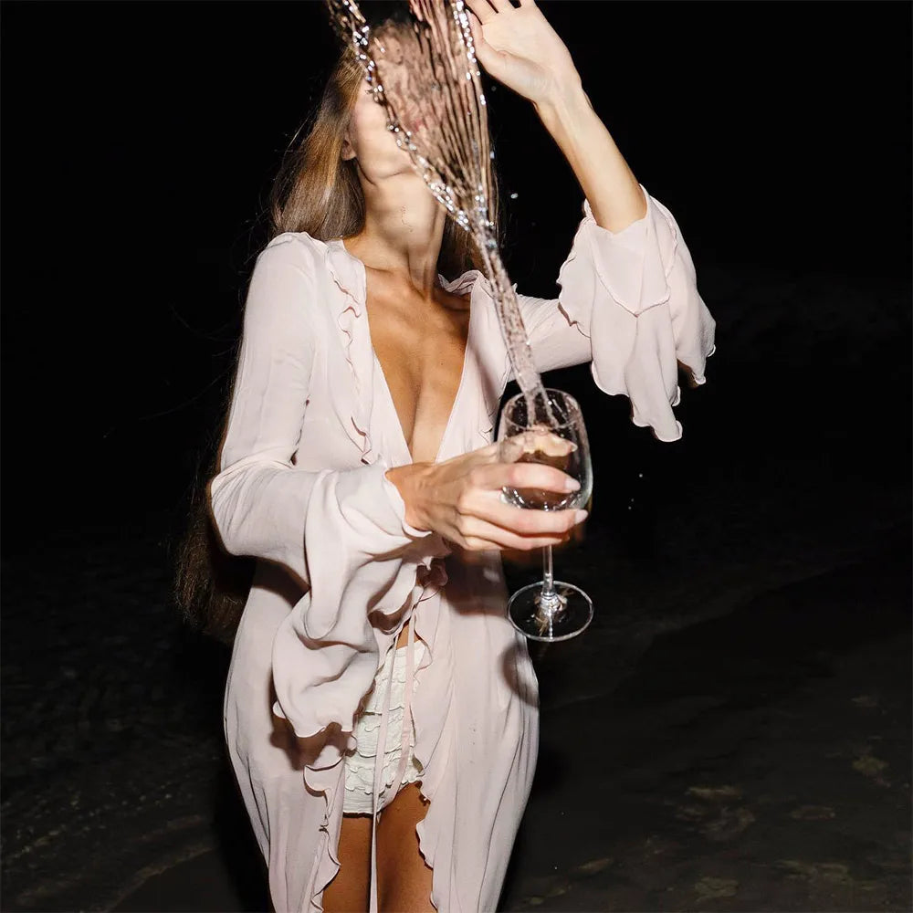 Elegant V-neck long-sleeve beach cover-up.